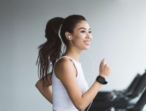 A woman jogging on a treadmill